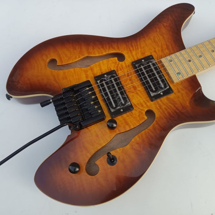 Headless Electric Guitar with Double F Holes (PWT-1902)